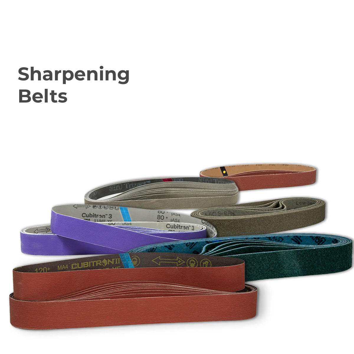 Three coiled professional knife sharpening belts including a reddish-brown 3M Cubitron II ceramic belt, a tan 3M Trizact micro-replicated belt, and a coarse grey profiling belt for power sharpening machines.