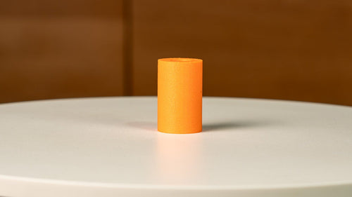 Isolated view of the precision-engineered orange thermoplastic spacer for the Tormek T-8 sharpening system.