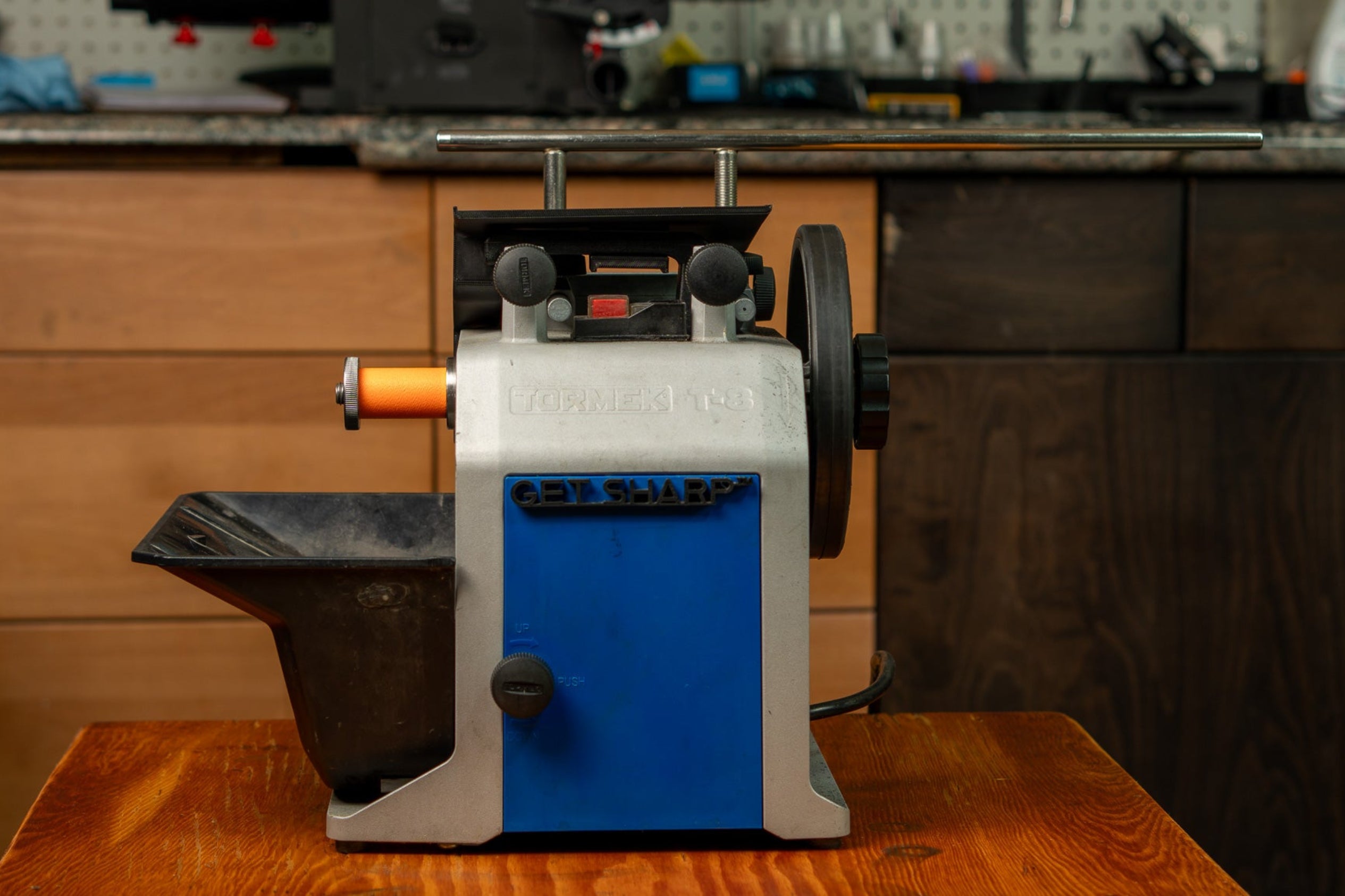 Tormek T-8 on bench with stone spacer for leather wheel