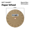 Compressed paper deburring wheel mounted for bench grinder knife sharpening.